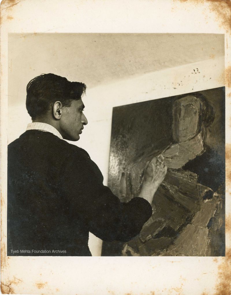 **Tyeb Mehta with painting, c. 1960s**
Photograph of Tyeb Mehta working on his painting.
